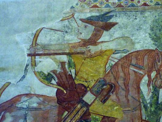 Két tartalék nyílvessző a kun harcos kezében a kakaslomnici templom freskóján