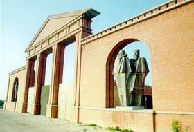 The entrance of the Statue park with the statues of Lenin and Marx and Engels