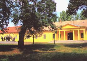 Arany János Museum with the monument "Grand School Staff" Arany János Museum with the monument "Grand School Staff"