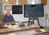 Talk with journalists Zsuzsa Takács and András Kopfinger in the hall of the school historical exhibition (1988)