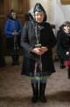 Rimóci asszony virágvasárnap a templomban